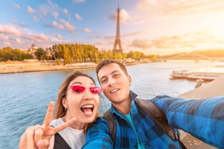 man and a woman taking a selfie on vacation