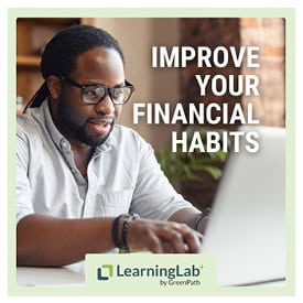 A young, black man using his laptop to view a Learning Lab+
